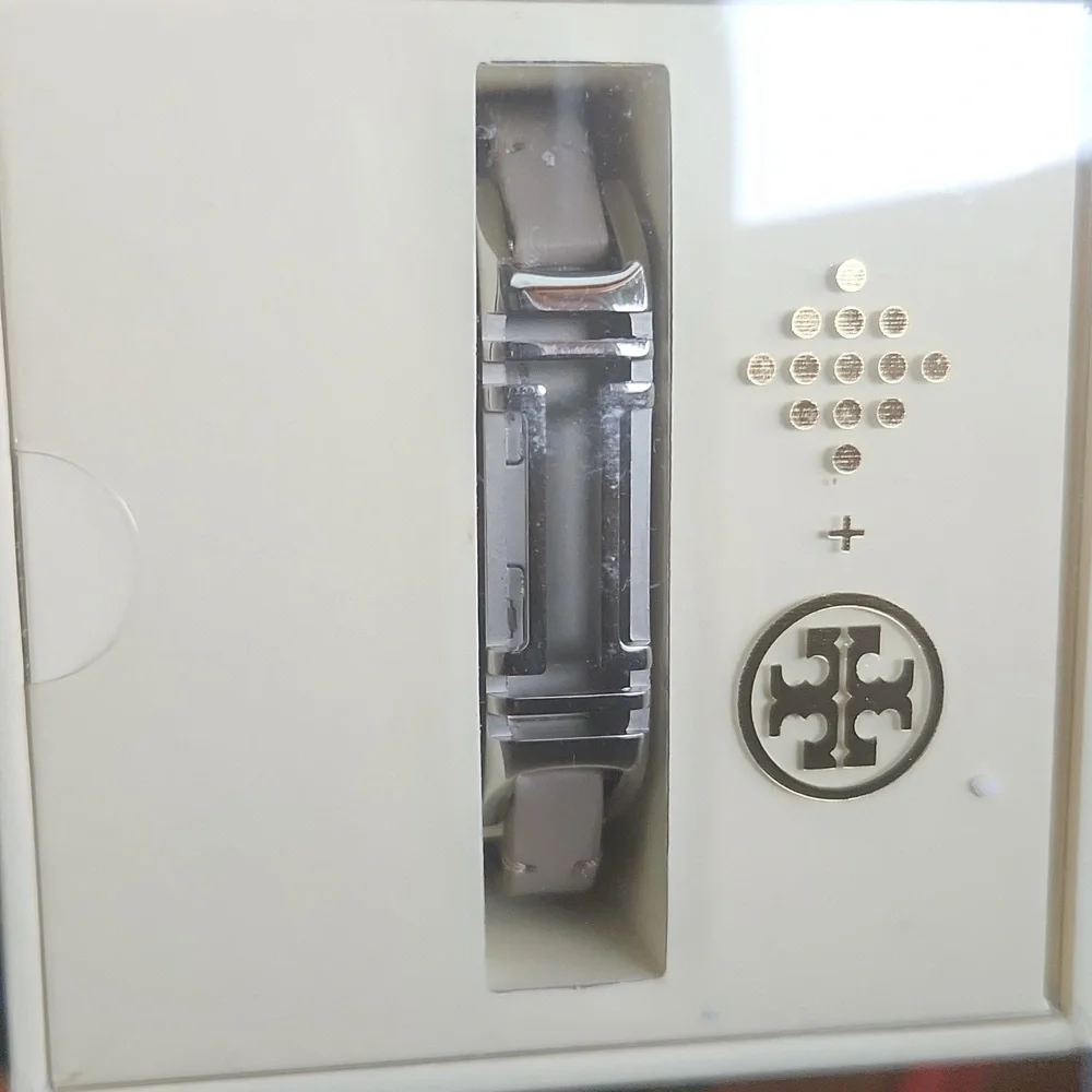 Fotbit With Charger 1 Brand New Tory Burch French Grey Braclet Plus 3 Used